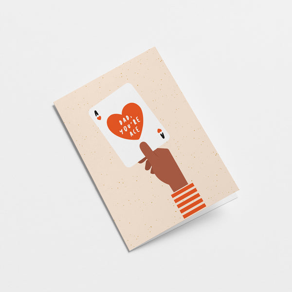 fathers day card with a black hand holding an ace of heart playing card with a text that says dad you’re ace  Edit alt text