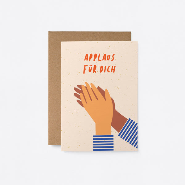 German congratulations card with a yellow and a brown hand clapping with a text that says Applaus für dich