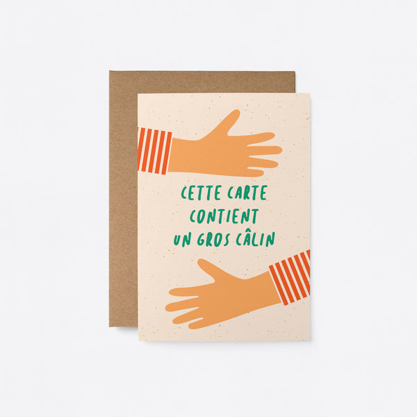 french greeting card with two arms hugging with a text of Cette carte contient un gros câlin