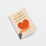 french Sympathy card with a hand holding a red heart and text that says Je t’envoie mon amour et mon soutien  Edit alt text