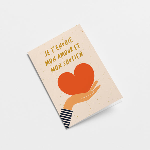 french Sympathy card with a hand holding a red heart and text that says Je t’envoie mon amour et mon soutien  Edit alt text