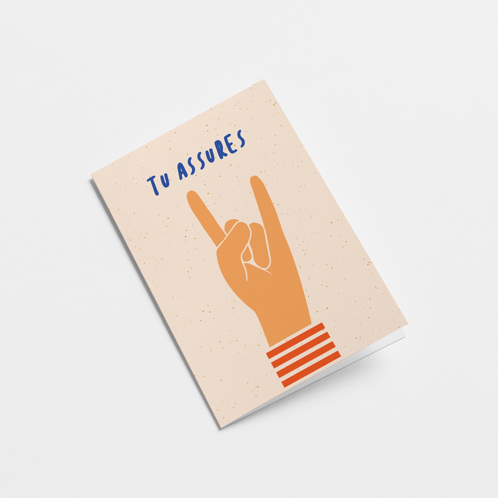 french encouragement card with a hand and a gesture of sign of the horns with a text that says Tu assures  Edit alt text