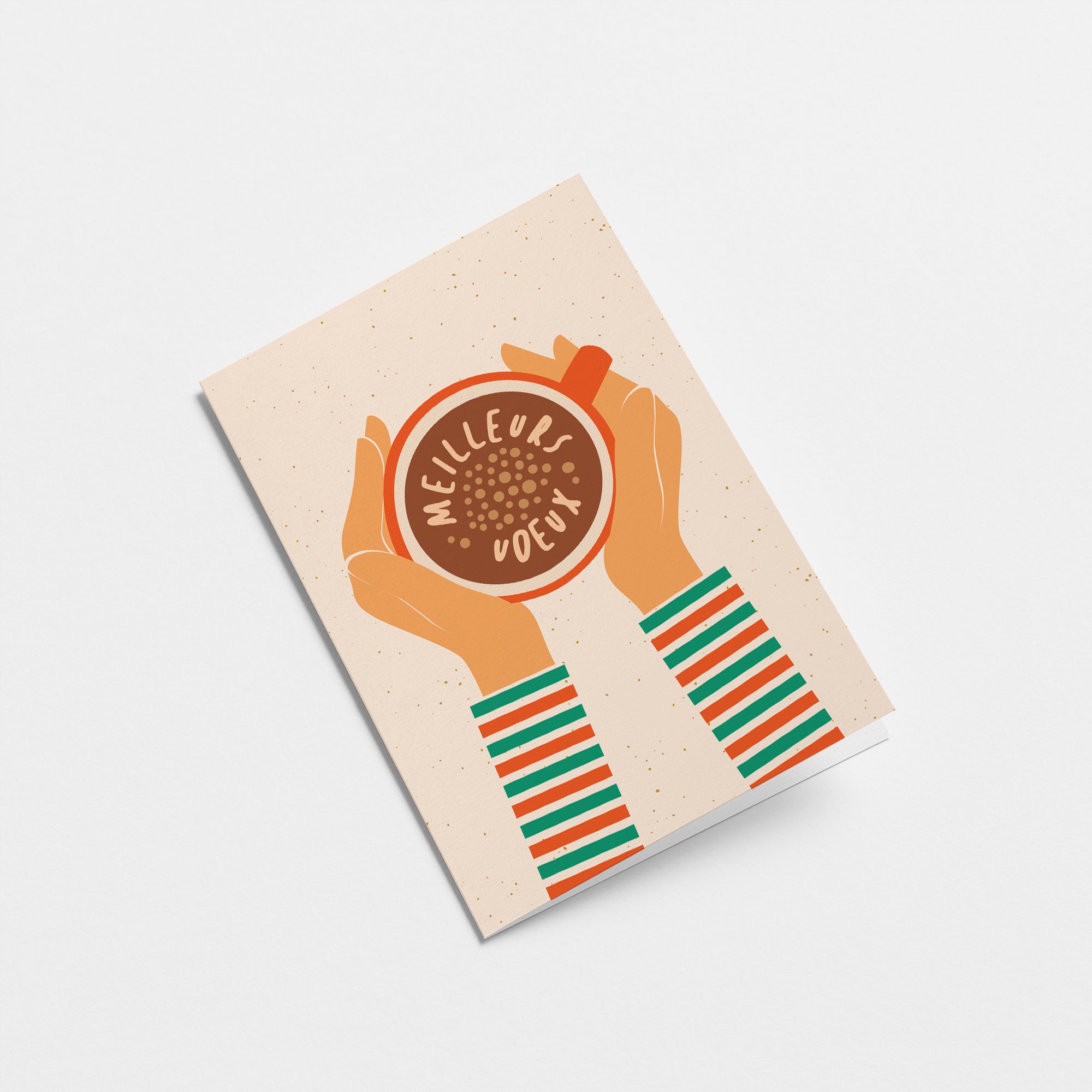 french Christmas card with a cup of coffee holded by two hands from sides and a text in it that says Meilleurs vœux  Edit alt text