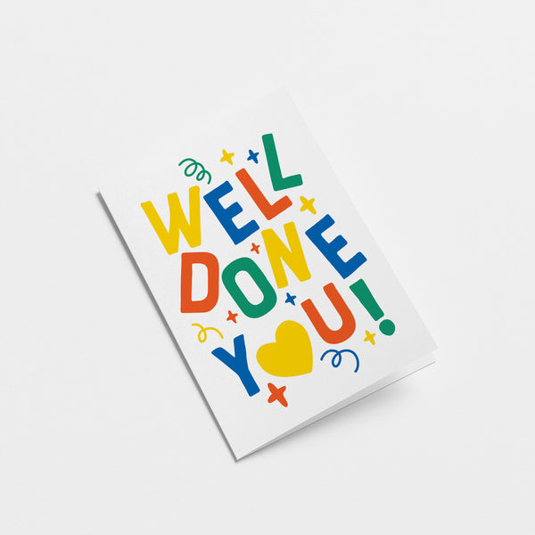 Congratulations graduation card with turned down letters with a text of well done you!  Edit alt text