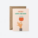 Birthday card with a hand holding a glass of wine and a text that says Cheers! Happy Birthday