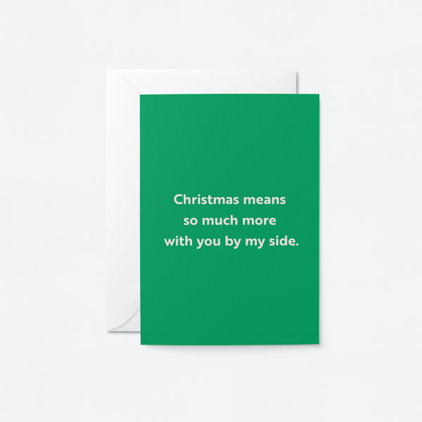 christmas card with a text that says Christmas means so much more with you by my side
