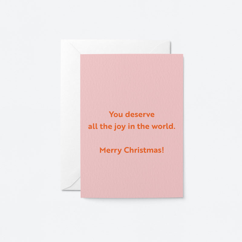 christmas card with a text that says You deserve all the joy in the world. Merry Christmas!
