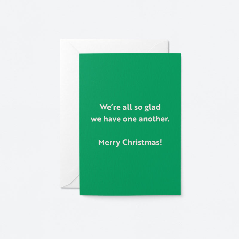 christmas card with a text that says We’re all so glad we have one another. Merry Christmas!